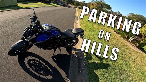 how to park a motorcycle on a hill and why the moon is shaped like a banana